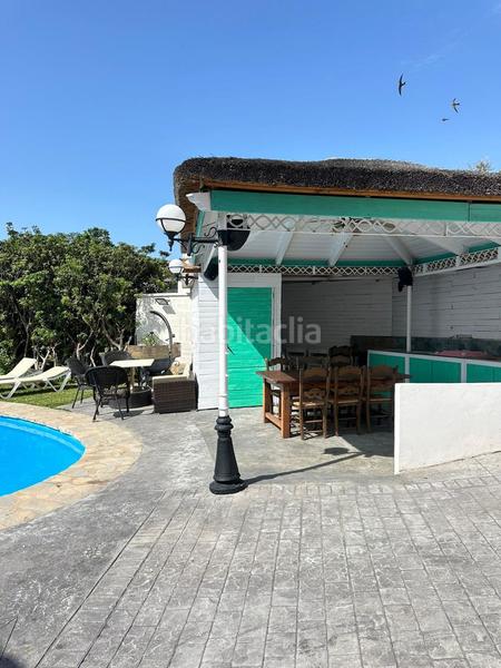 Foto d24653c3-6e9c-4175-b01e-a579985db800. Chalet  en venta en Torremuelle, 2 dormitorios. en Benalmádena