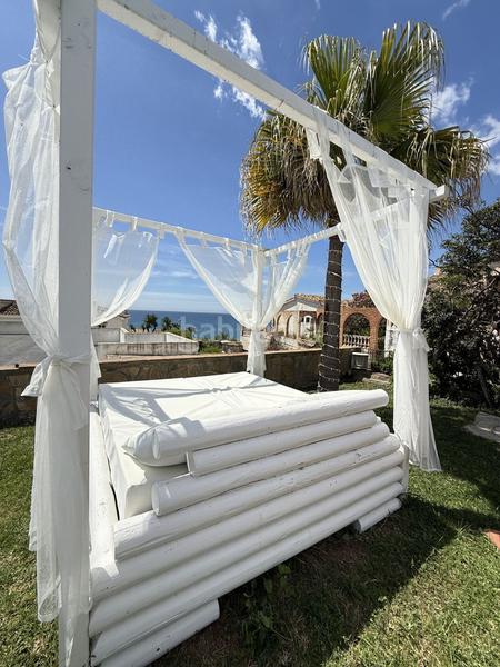 Foto ec833f93-9b0c-46e1-8a4f-5592ef62c834. Chalet  en venta en Torremuelle, 2 dormitorios. en Benalmádena