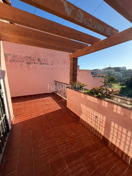 Foto 927f1d77-8cd1-451e-8b79-cd44a853d83a. Casa adossada amb calefacció aparcament piscina a Mijas