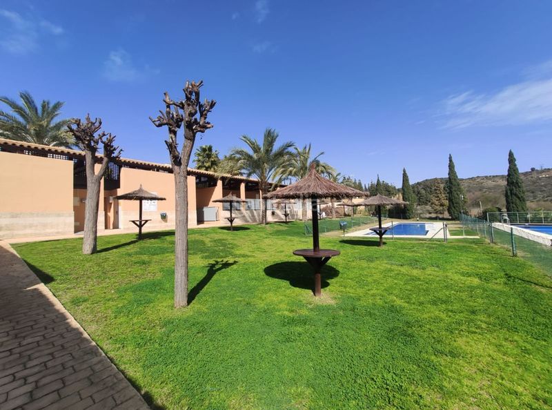 Foto 3d56ae3e-7607-411a-9bb3-3b95c46e5b5d. Casa adossada amb calefacció aparcament piscina a Mijas