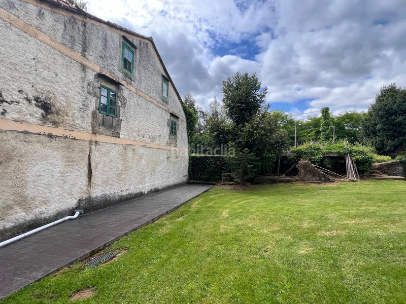 Foto 14ff4961-ceaf-4cad-a02a-0f24e4914091. Casa aparellada amb aparcament a Cambre