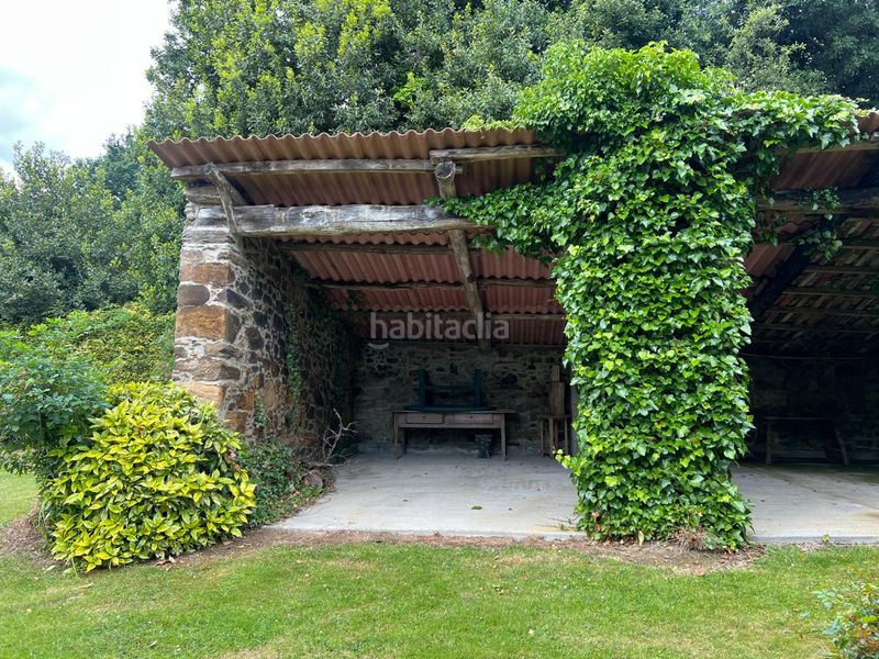 Foto 49145810-938e-4da7-a4d5-7885a95794a6. Casa aparellada amb aparcament a Cambre