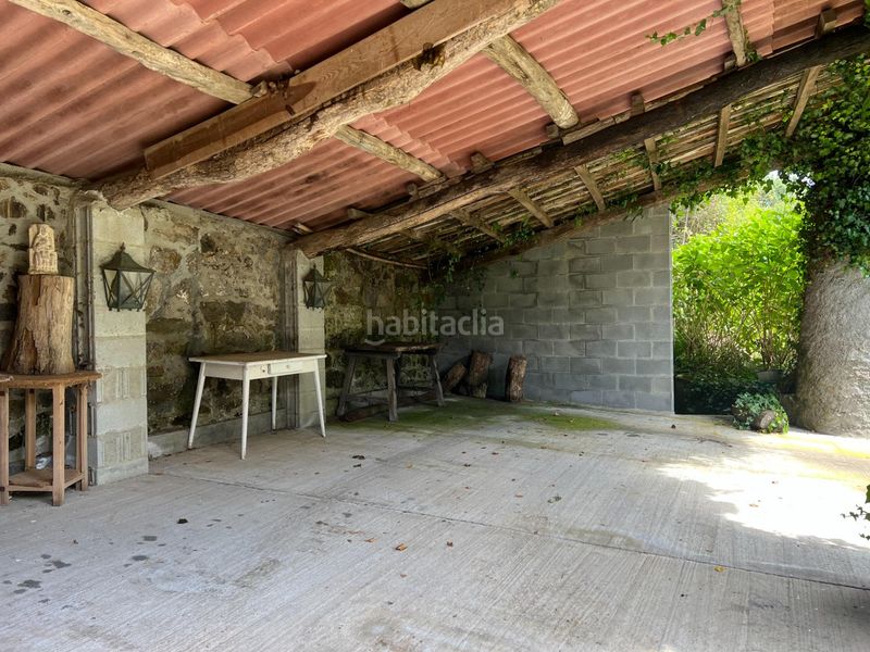 Foto 988ffe16-c6a7-4fa7-b35c-67b170b211bb. Casa aparellada amb aparcament a Cambre