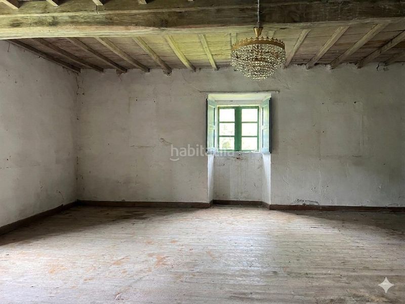 Foto a30d777a-d74b-4d05-a27b-a9149ece97ab. Casa aparellada amb aparcament a Cambre