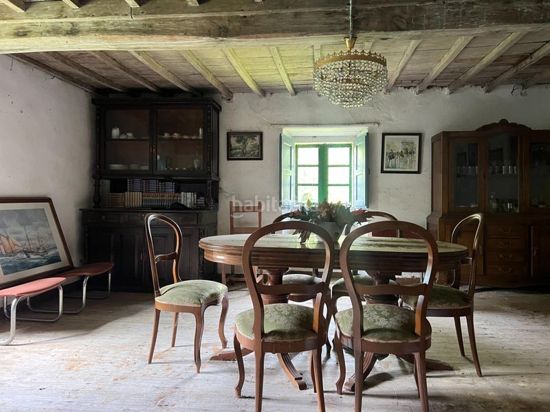 Foto b3b458be-c68a-41fe-ba01-c882a60ee474. Casa aparellada amb aparcament a Cambre