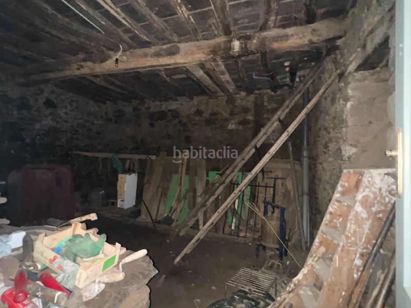 Foto edc89c78-32db-406f-adf6-730c2d8fc73b. Casa aparellada amb aparcament a Cambre