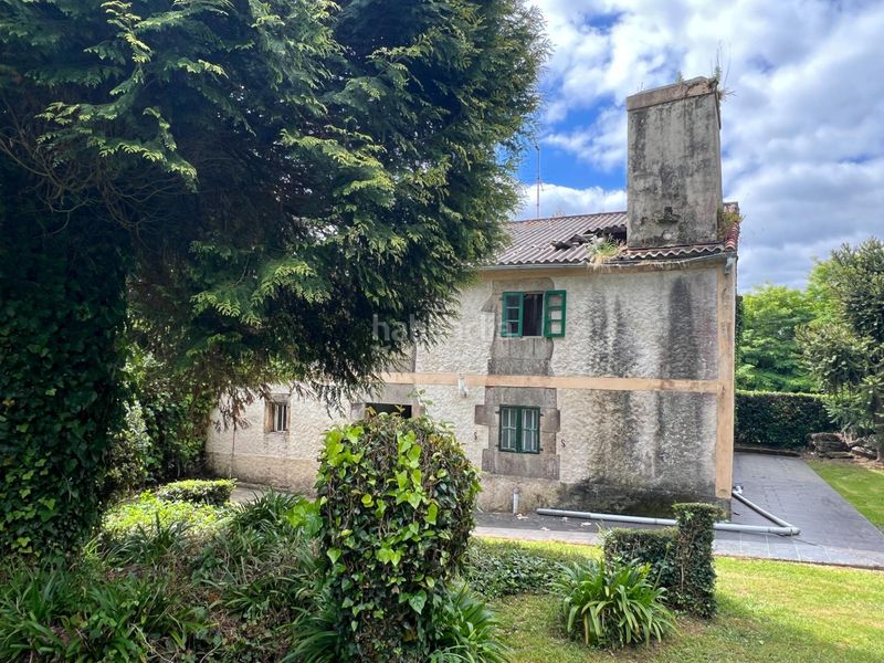 Foto f16d7967-e266-4450-ba8b-b253cdfe02c5. Casa aparellada amb aparcament a Cambre