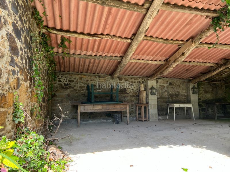 Foto f33c142b-d685-4c11-be16-fdf999001a9f. Casa aparellada amb aparcament a Cambre