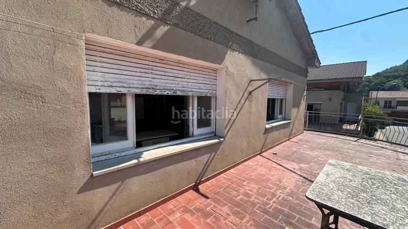 Foto 4b89bbf7-bfa1-40ca-9901-340aabbb73c9. Casa aparellada a carrer dels paperers 12 a Sant Joan les Fonts