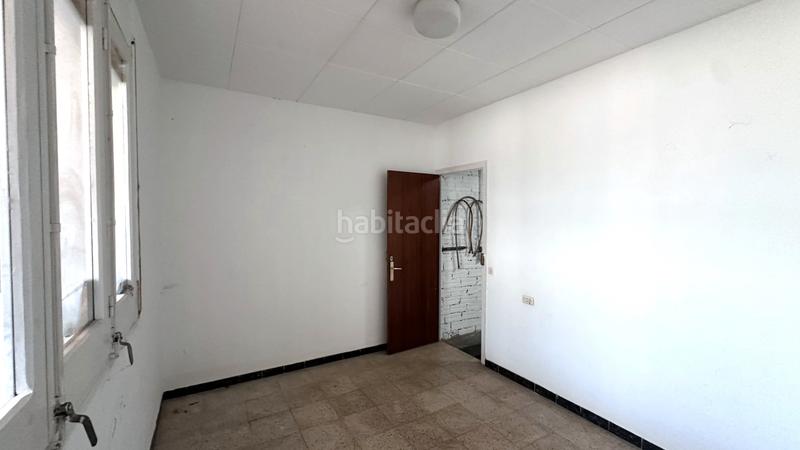 Foto 5761cd3f-8bdb-4705-9bce-cebd48667739. Casa aparellada a carrer dels paperers 12 a Sant Joan les Fonts