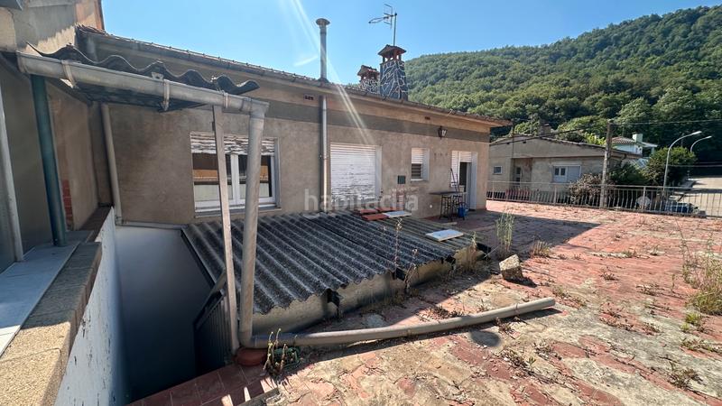Foto 5c59f394-c99c-4a9a-95fc-fb76b0e9ea5e. Casa aparellada a carrer dels paperers 12 a Sant Joan les Fonts