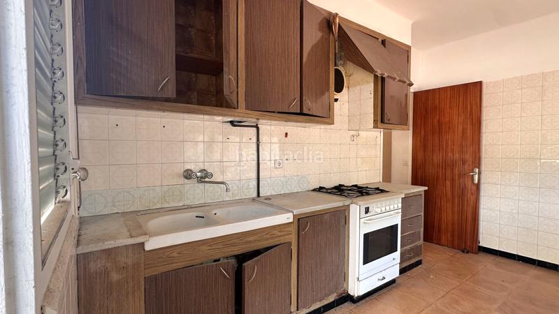 Foto b3e27f1b-8969-4283-81e5-d35eca809406. Casa aparellada a carrer dels paperers 12 a Sant Joan les Fonts