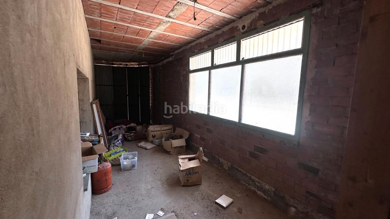 Foto b5621c22-6336-4296-a848-34534b5d7e82. Casa aparellada a carrer dels paperers 12 a Sant Joan les Fonts