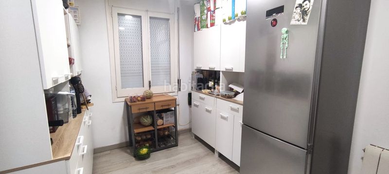 Foto 7a43726d-85de-41a5-a664-101415ae1885. Casa aparellada amb xemeneia calefacció a Olot