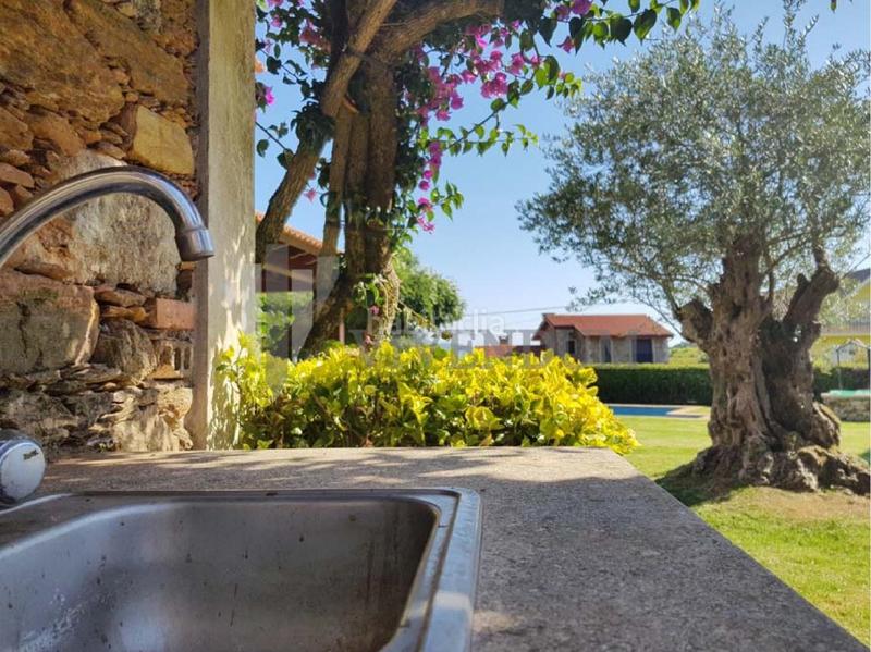 Foto ac78ae13-3687-4996-9fd8-560c9c6cc768. Chalet mit heizung parking pool in Rosal (O)