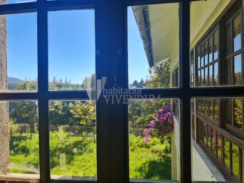 Foto a14e4243-1584-4c3e-b213-f598e914386e. Casa amb piscina a Redondela