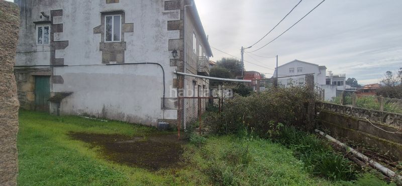 Foto f5ebedec-ede7-45bf-a557-3ba35eb2277e. Haus mit parking in Bembrive Vigo