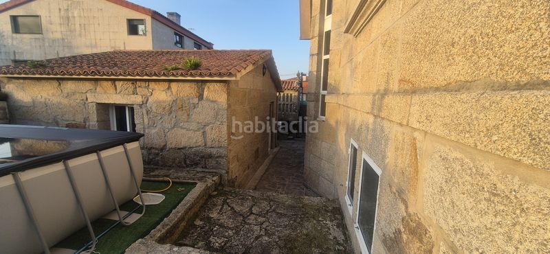 Foto a409feed-5d9a-43e6-862a-94d4cbceb729. Xalet amb xemeneia calefacció aparcament piscina a Vigo