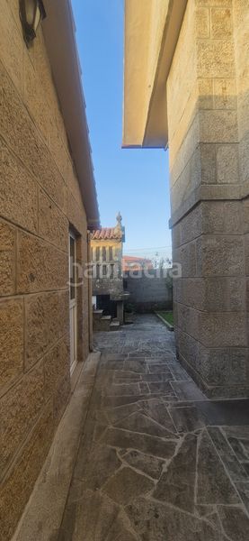 Foto e144f680-fb10-4b53-886b-eac847e7ea47. Xalet amb xemeneia calefacció aparcament piscina a Vigo