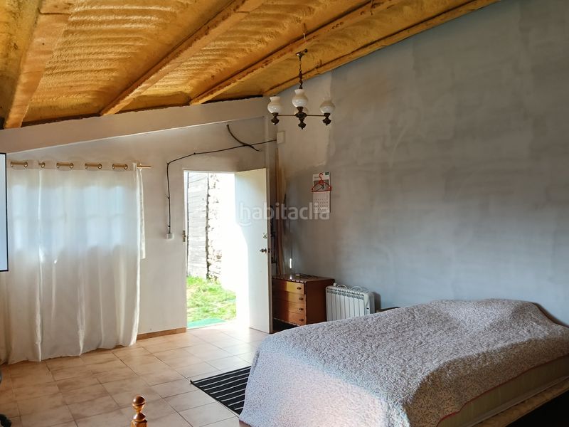 Foto c0483cc6-2b7c-4418-bcb6-43951ddf4e48. Casa adossada a Carral
