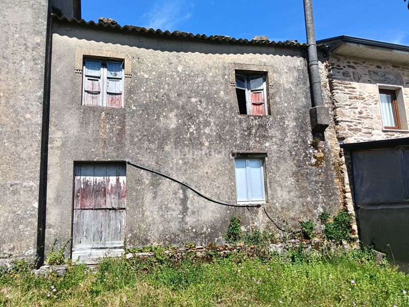 Foto dd96e174-76a7-4d8f-9df2-1e8ae661e061. Casa adossada a Miño