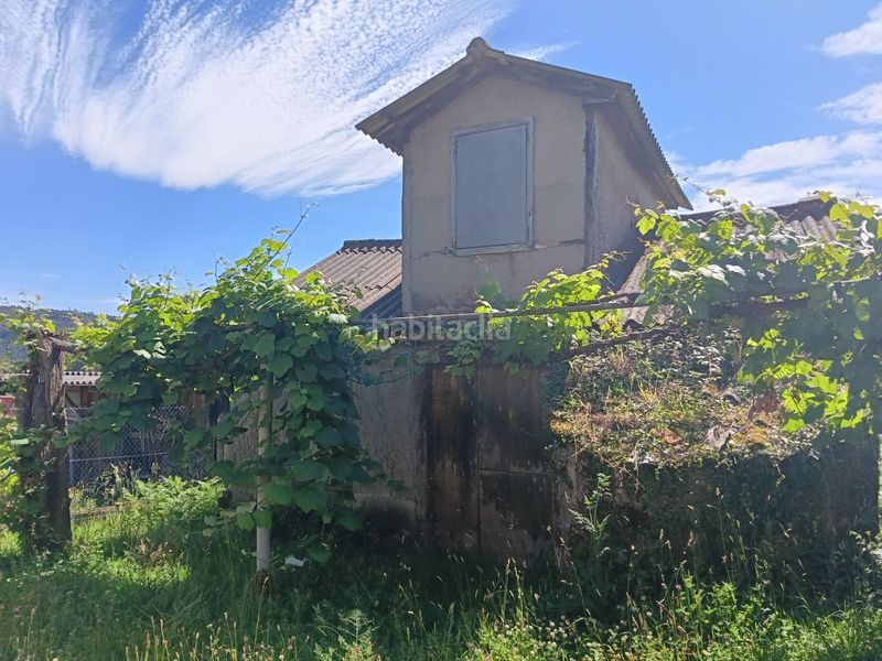 Foto e9e7bfc0-f7c1-493f-b4c4-1c82e02166e2. Casa adossada a Miño