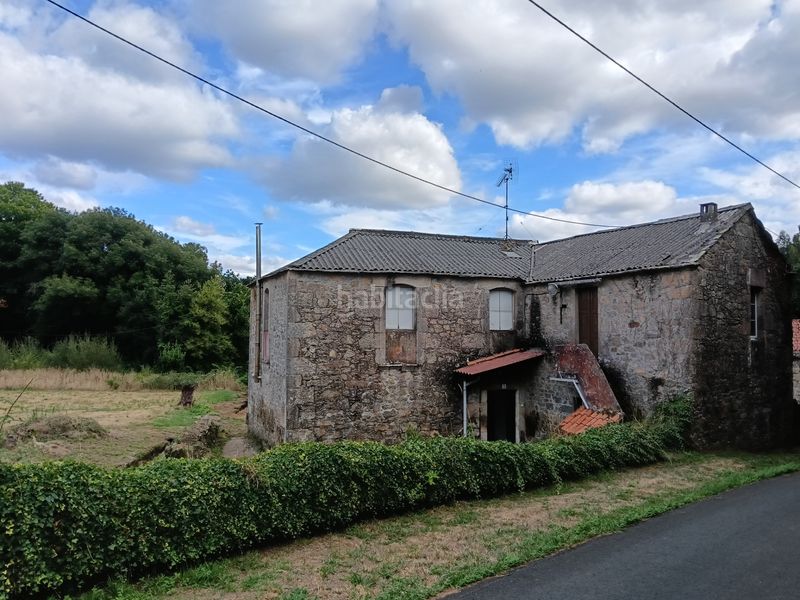 Foto 84e932d2-5425-47a7-a4e6-587bfe168338. Casa amb aparcament a Miño