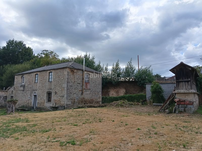 Foto 85cf5260-c453-4266-abca-3fa57bdcef0c. Casa amb aparcament a Miño