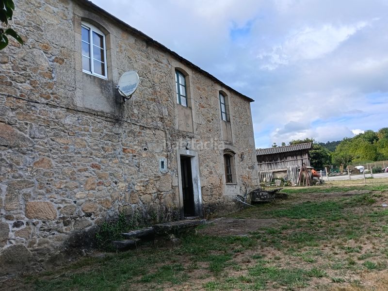 Foto a0e38f8b-c1e2-4e94-af48-b0bb12606a21. Casa amb aparcament a Miño