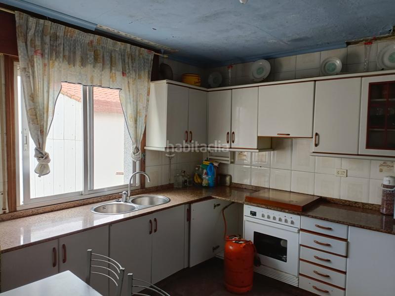 Foto 5898633b-62d6-4b2c-8cf5-7d77c01c96d3. Casa adossada a avenida principal 107 a Curtis