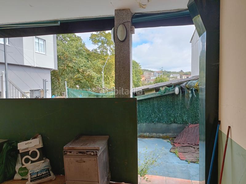 Foto bafab093-41ca-4b49-bfa2-395ad385a9d0. Casa adossada a avenida principal 107 a Curtis