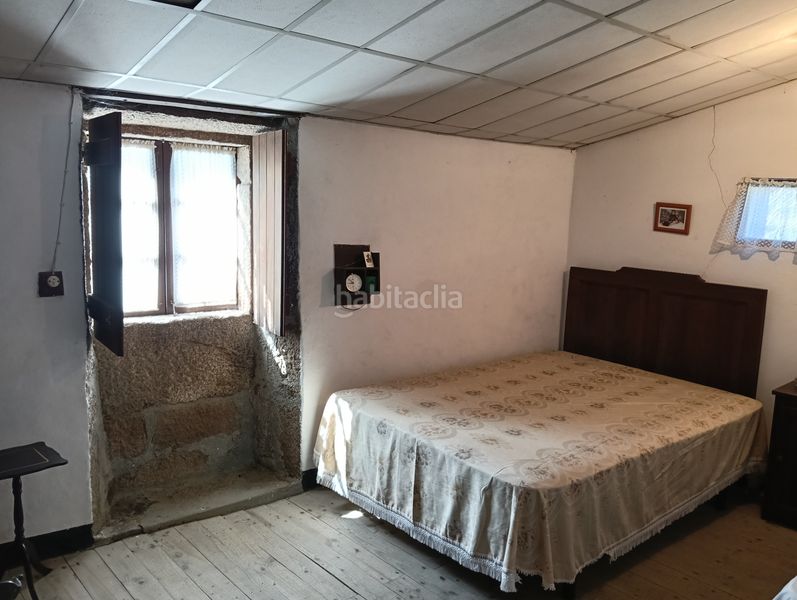 Foto 0f7d619b-fc43-4764-bf22-e2384c43e19a. Casa adossada a Oza dos Ríos