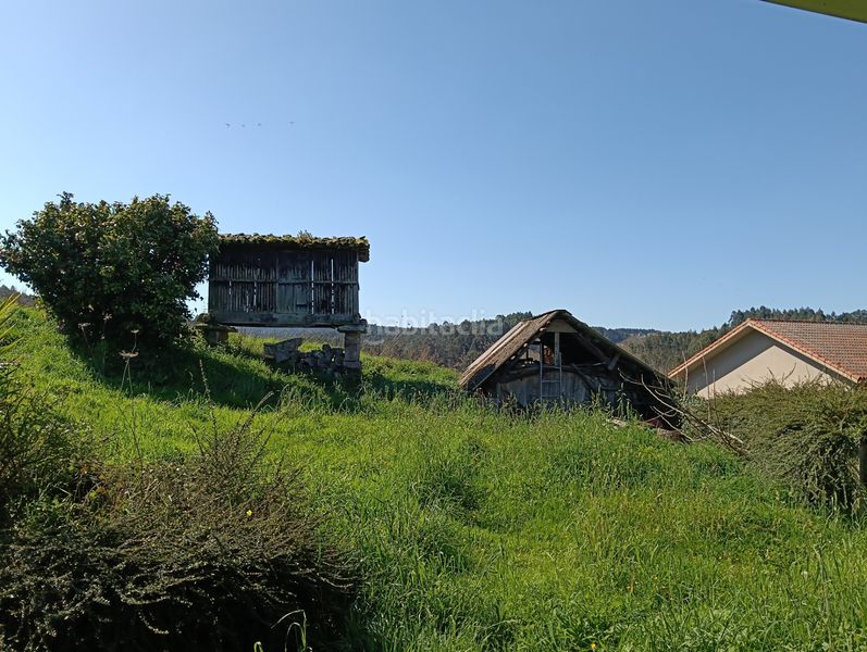 Foto a911e568-7cce-4d84-9d49-4317120c1d2d. Casa adossada a Oza dos Ríos