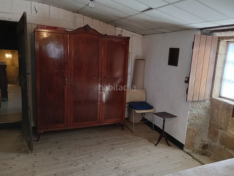 Foto cf19f4ec-d521-453f-a2c1-5a3c2be75592. Casa adossada a Oza dos Ríos