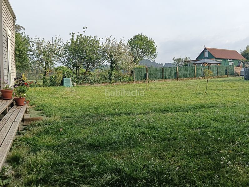 Foto a96e0c7e-8df3-46b9-9ff8-b67f1b43ec40. Casa adossada amb calefacció a Bergondo