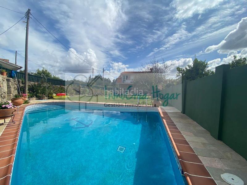 Foto 10c7c297-812b-46f8-bb62-da6aa6c0d323. Chalet con riscaldamento parcheggio piscina in Navia Vigo