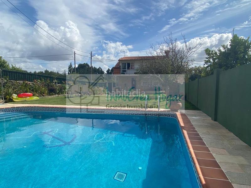 Foto d44598ee-c771-452c-9a43-06e844886b88. Chalet con riscaldamento parcheggio piscina in Navia Vigo