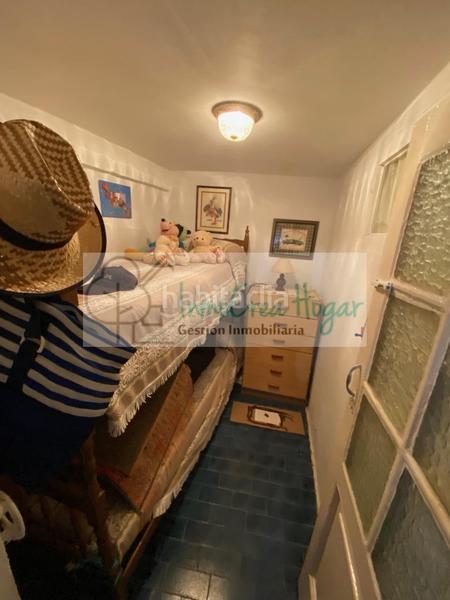 Foto ecdd6b01-ae33-4920-a2aa-3ac84edf28c8. Casa adosada en Navia Vigo