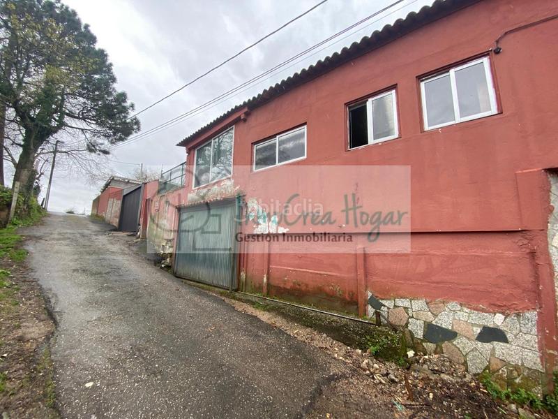 Foto 75be9812-28f8-4763-bff2-3a3a53b056dd. Casa adossada amb calefacció aparcament a Navia Vigo