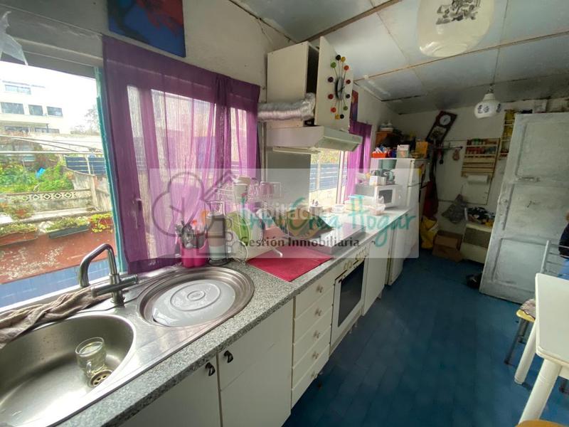 Foto 13fabd1b-1db2-4e00-8008-30b5627fe124. Maison jumelée avec chauffage parking dans Navia Vigo