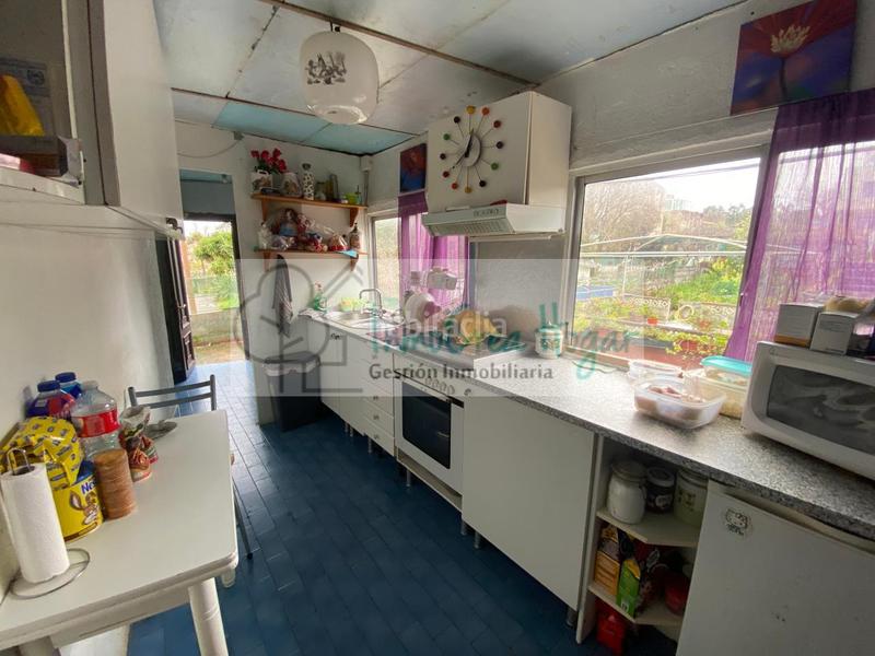 Foto cca98327-604c-4f29-9e24-76ddf915b575. Reihenhaus mit heizung parking in Navia Vigo