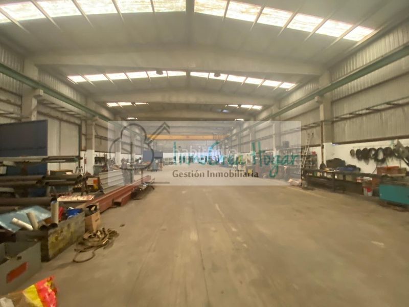 Foto daa5d0af-5ff1-46df-bd39-fbc6286a6a81. Nau industrial a Ponteareas