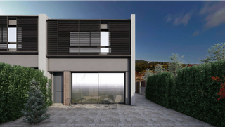 Casa adossada a Selva del Camp (La). Unifamiliar con amplio jardin