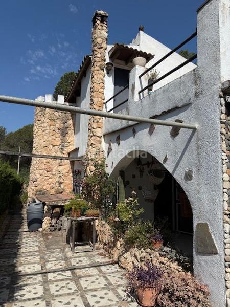 Foto a1b4caaa-4e21-4314-8fb7-6db33f2fce94. Casa atención! fantástica oportunidad de adquirir un chalet rústico con encanto en la prestigiosa urbanización mas del plata de cabra d en Cabra del Camp