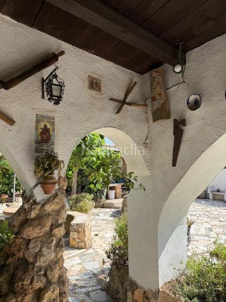 Foto b5d2c196-5c0a-41d3-95eb-3a0ae412b9cb. Casa atención! fantástica oportunidad de adquirir un chalet rústico con encanto en la prestigiosa urbanización mas del plata de cabra d en Cabra del Camp