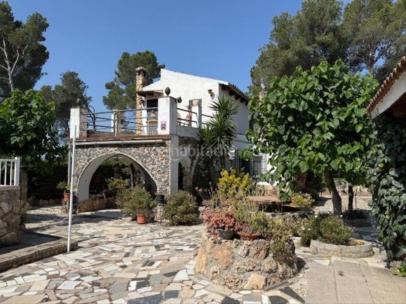 Foto bc1880ea-cc9b-4398-8c8e-d5750738b233. Casa atención! fantástica oportunidad de adquirir un chalet rústico con encanto en la prestigiosa urbanización mas del plata de cabra d en Cabra del Camp