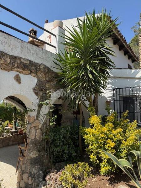 Foto ffe2445e-e81a-4319-b868-434376411980. Casa atención! fantástica oportunidad de adquirir un chalet rústico con encanto en la prestigiosa urbanización mas del plata de cabra d en Cabra del Camp