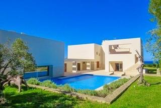 Chalet à Las Rotas / Les Rotes. Exclusiva villa moderna en primera línea del mar en dénia