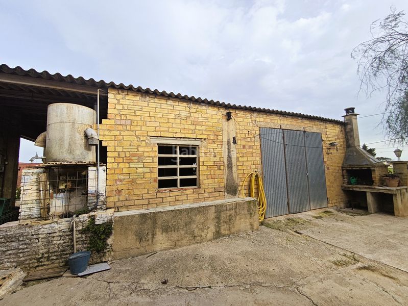 Foto 741db957-1c50-4bab-b56e-4560ffe7e45d. Masia amb aparcament a Aldea (L´)