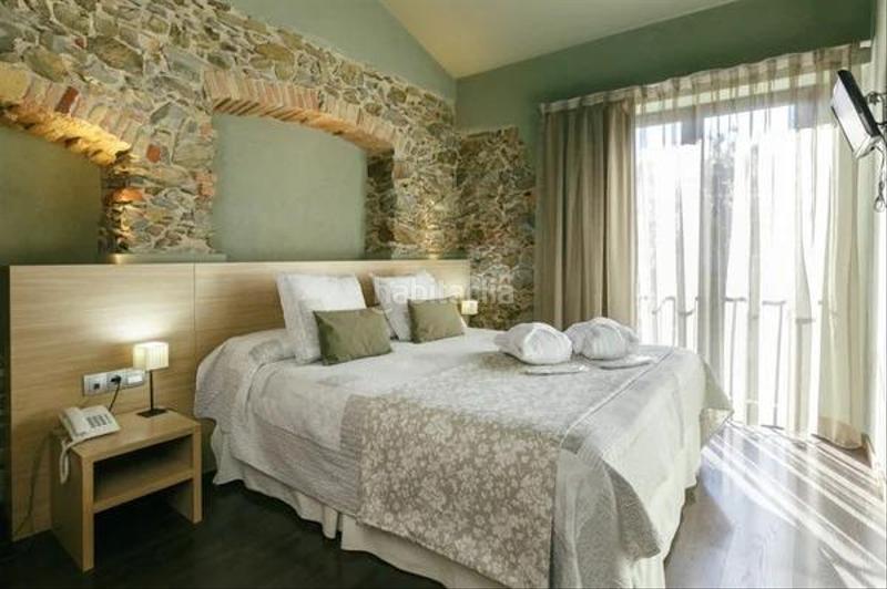 Foto 3e385f34-4ab3-4782-924c-4da3d3f33564. Edificio hotel con spa en venta en Garriguella